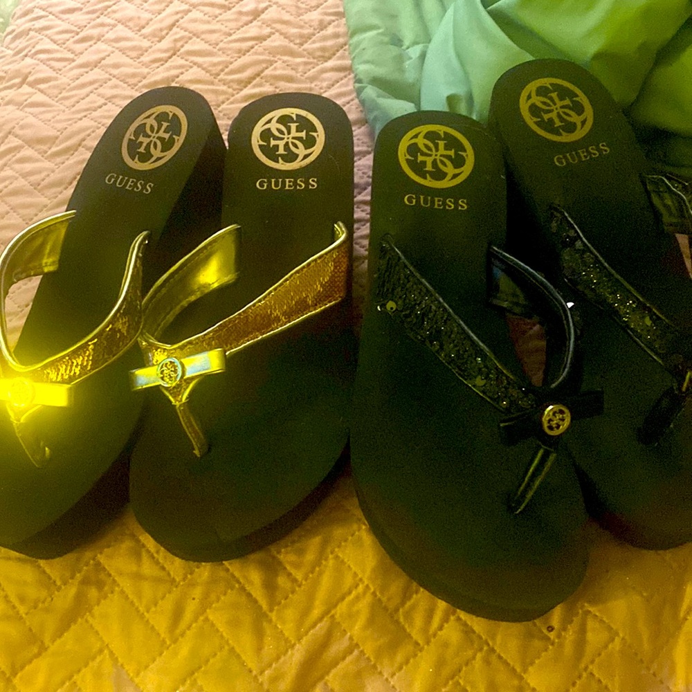 Two pair of ladies sandals one gold one deck